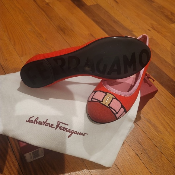 Brand new. Ferragamo size 7 flats.